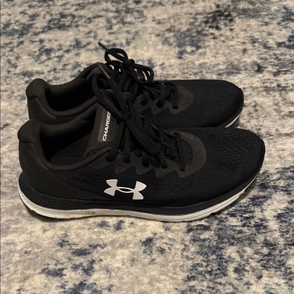 Under Armour women’s Black and White Athletic Shoes